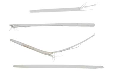 Isolated airplane illustration on white background surrounded by various metal objects and surgical tools