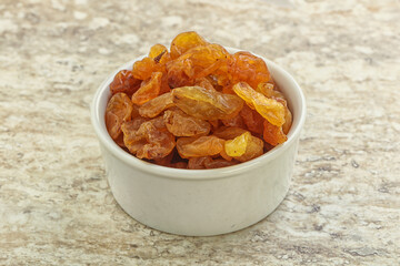 Sweet yellow raisin in the bowl