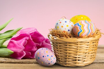 Baby Easter gifts. eggs and fresh flowers,