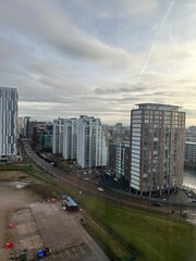 Aerial view of modern buildings and landmarks in Salford Quays.  