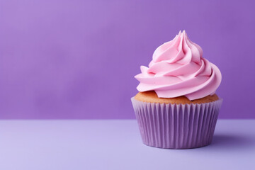 Cupcake With Pink Frosting on Purple Surface - obrazy, fototapety, plakaty