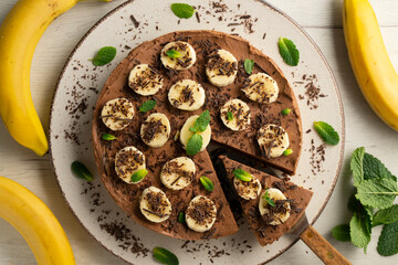 Delicious and fluffy chocolate mousse cake with banana and orange aroma.