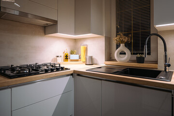 New modern kitchen cabinets will bring warmth to your kitchen. White glossy kitchens with a...