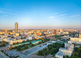 Fototapeta premium Embankment of the central pond and musical fountain. The historic center of the city of Yekaterinburg, Russia, Aerial View