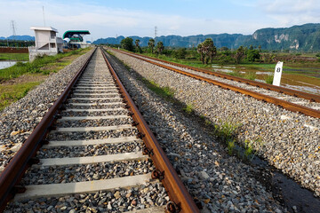 A view of the railroad tracks in the countryside in Indonesia