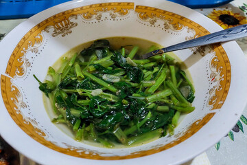 kale vegetables on a plate on the dining table
