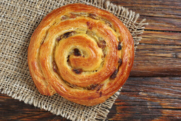 Puff pastry bun with raisins