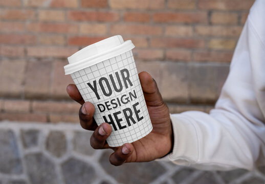 Mockup of man with customizable disposable cup