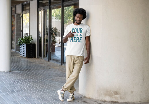 Mockup of man by wearing customizable t-shirt, full length