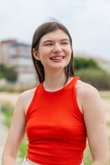 Young pretty woman at outdoors . Portrait