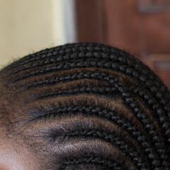 Brown skin woman with straight back cornrows, cornrow braids on brown skin, african american woman with cornrowed hair