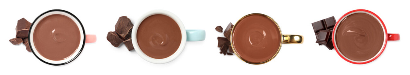 Delicious hot chocolate in cups isolated on white, top view