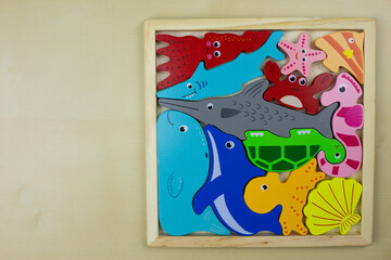 Wooden puzzle with sea creatures