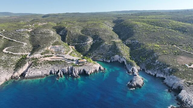 Aerial drone View Of Porto Limnionas Beach In Zakynthos Island Greece. Porto Limnionas Beach Zakynthos Greece. Vacation turquoise sea and green rock cliffs on the island.