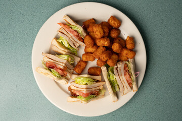 Club sandwich and tater tots