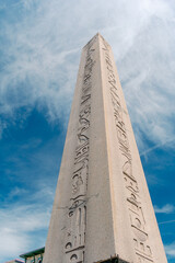 Obelisk of Theodosius in Istanbul. Ancient Egyptian obelisk against a blue sky.