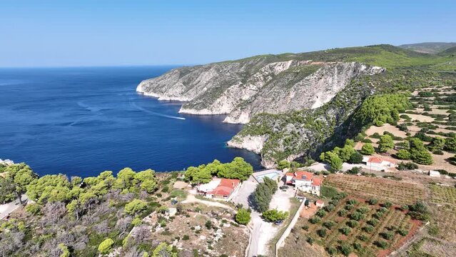Drone viewpoint of Cliffs of Kambi in Zakinthos Greece Island. Beautiful cliff coast on greek island. Wild cliffs of the western Zakynthos. Vacation turquoise sea and green rock cliffs on the island. 