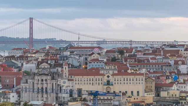 Lisbon Portugal time lapse, high angle view day to night sunset city skyline at Lisbon Baixa district
