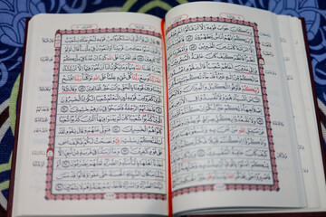 Quran, Al Qur'an, Islamic background for Eid al-Fitr Eid al-Adha. Open page of Al-Quran. Islamic concept