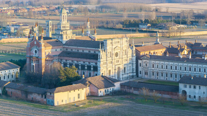 Obraz premium Aerial shot of Certosa di Pavia cathedral a historical monumental complex that includes a monastery and a sanctuary. Pavia ,Italy.