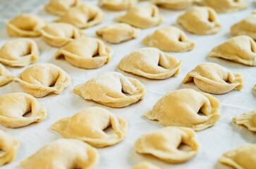 Home made dumplings on white linen cloth