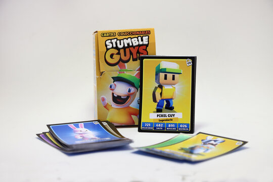 Stumble Guys collectible card game. Board game for children with the characters from the video game Stumble Guys in collaboration with the rabbits from Rabbids invasion. Isolated white.ground
