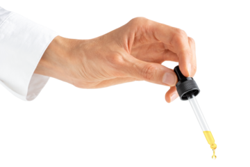 Scientist hand holding pipette dropper with essential oil or serum isolated on white or transparent background.