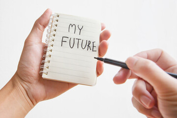 My future hand writing on mini notebook; Plan your future concept