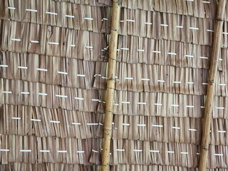 View from the southern side of a traditional thatched roof in a rural village. That thatched roof can be sunproof and rainproof. And good ventilation The history of hay or old hay.
