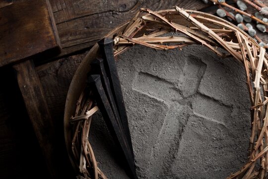 Cross crucifix made of ash, christian religion.