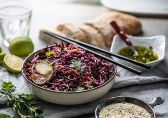 Poster Asian red cabbage and carrot salad seasoned with coriander and sesame © weyo