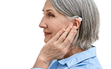 Middle-age woman with hearing impairment using hearing aid, side view. Hearing solutions for deafness people