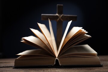 Religion Concept. Bible book with wooden Cross
