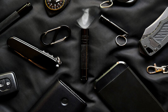 EDC Survival Gear on Black Background