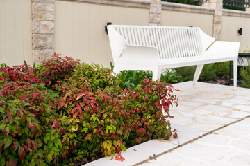 White bench in a summer resort.