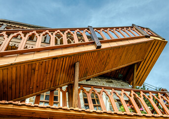 A wooden staircase near the exterior wall of the house.