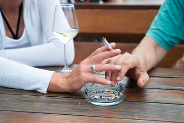 Close-up of couple touching hands showing love and care