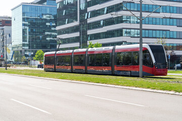 Modern tram on the city street.