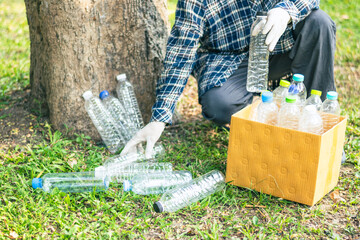 Store waste plastic bottles in cardboard boxes.