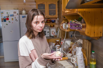Teenage girl preparing homemade buns