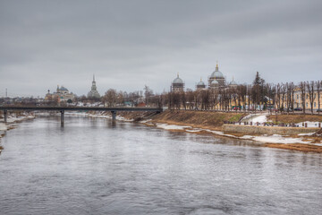 Old churches on the banks of the river in the Russian city of Torzhok.