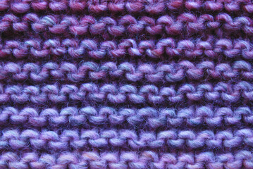 Fototapeta na wymiar Purple color purl knit surface texture as background
