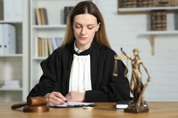 Judge working with document at table indoors
