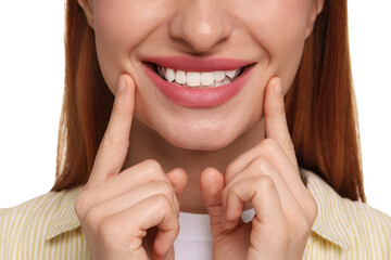 Woman showing her clean teeth and smiling on white background, closeup