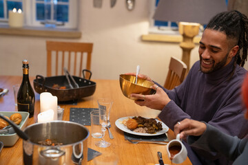 People plate food at dinner at home 