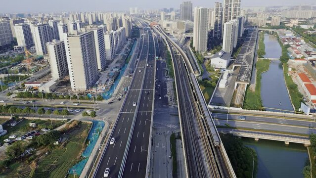 Aerial view of subway riding across the residential district in Shanghai.