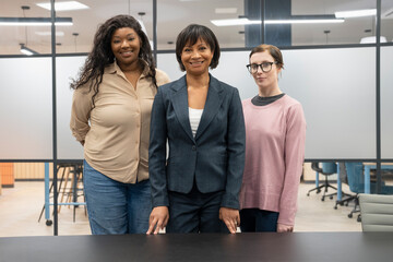 Portrait of smiling businesswomen in office