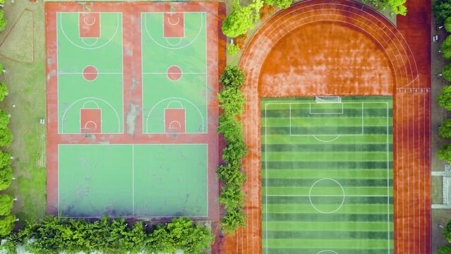 Aerial view of sports ground with stadium for football and basketball.