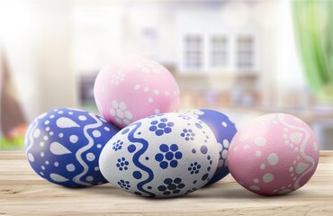 Collection of the beautiful colored easter eggs in the basket