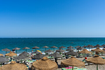 Walking on sea promenade in Benalmadena, Spain